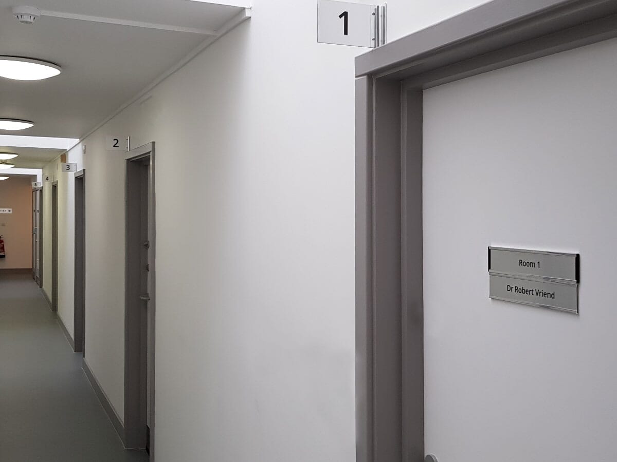 Door signs in a corridor