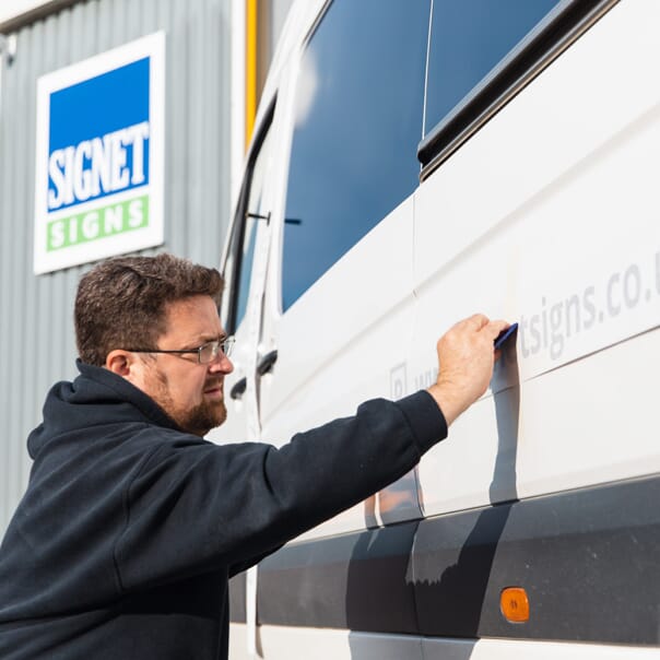 A Sign Maker working